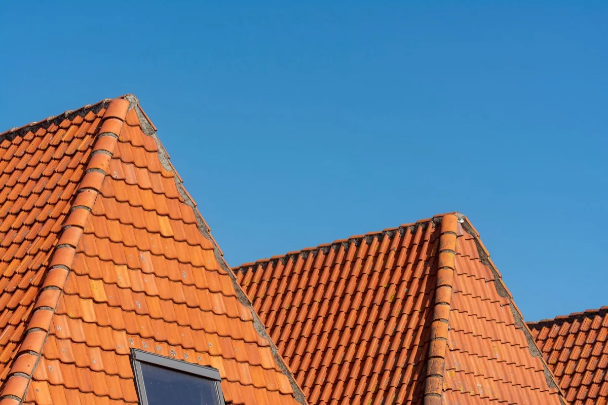 Clay barrel tile rooflines on homes in West Jordan, UT